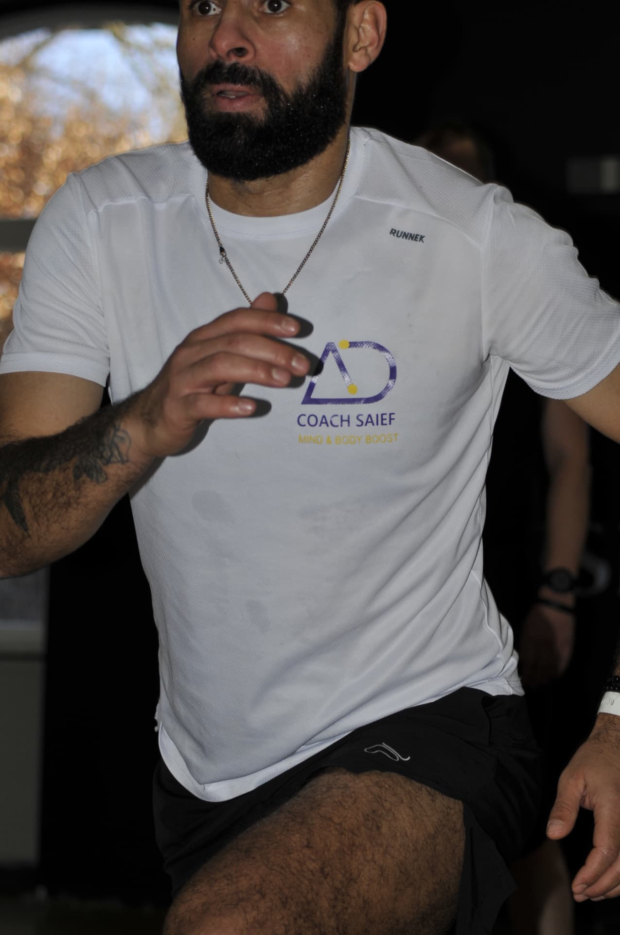 Coach Saief en action, t-shirt Coach Saief Mind & Body Boost, pendant un entraînement